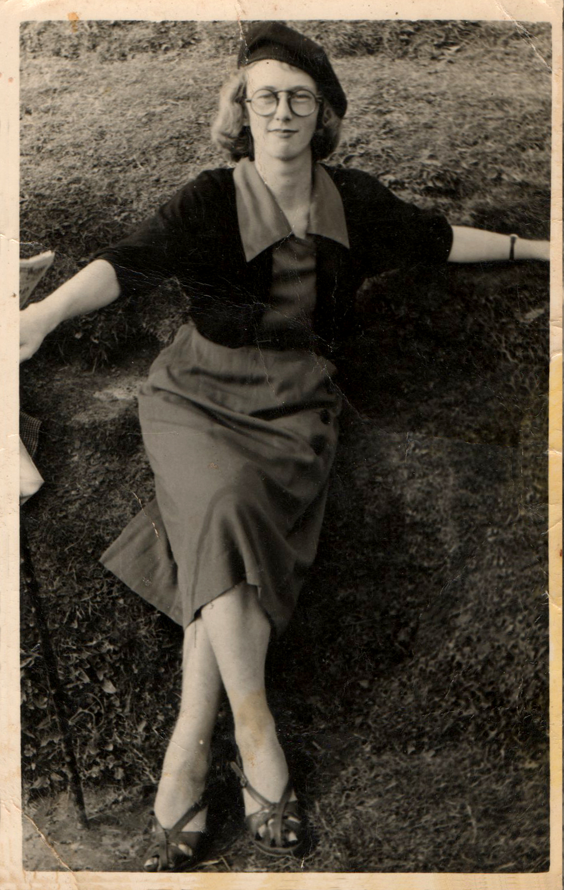 My mum at 18, modelling with style her dad's cap, glasses & walking stick!!