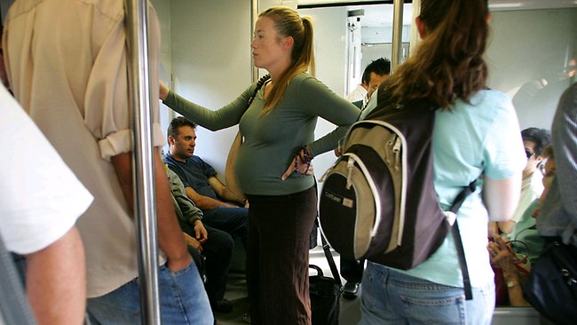 Pregnant woman on the train